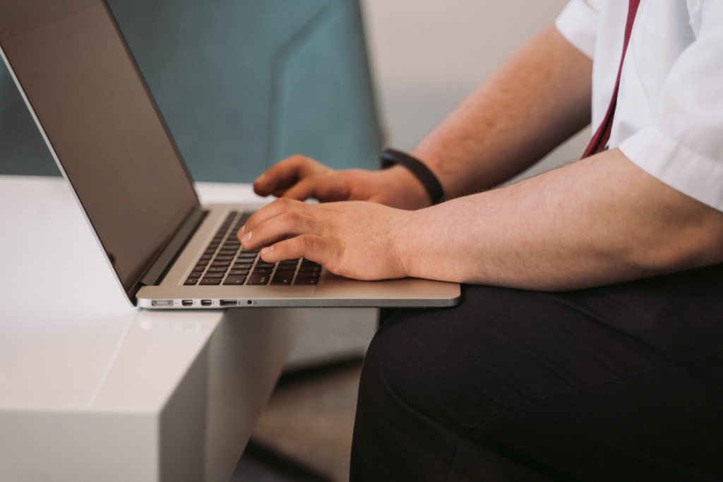 A man using a MacBook